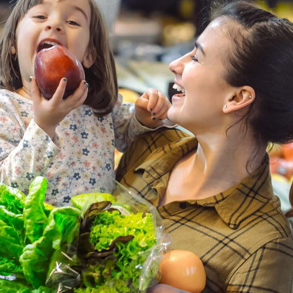 A mother holds a child.