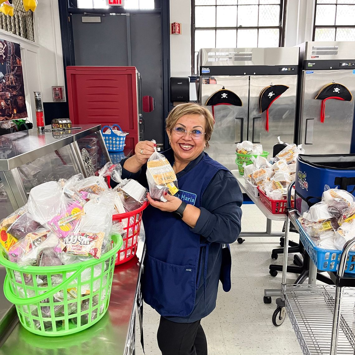 School nutrition staff at Prospect Hill Academy get ready to serve students breakfast.