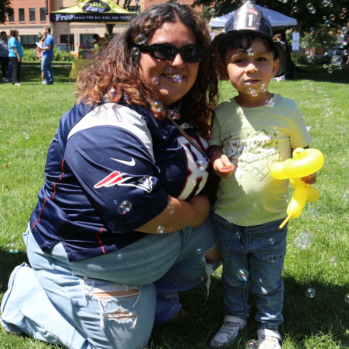 A parent and their kid at Summer Eats Waltham