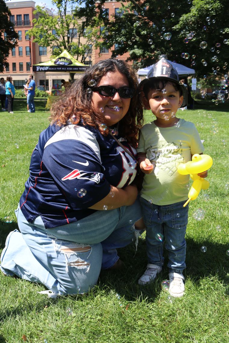 A parent and their kid at Summer Eats Waltham