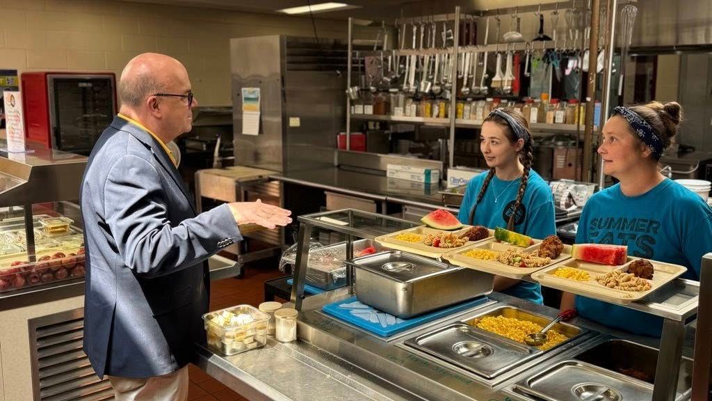 Congressman McGovern speaking to cafeteria staff in cafeteria