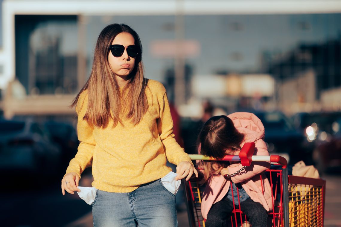 A mom goes grocery shopping with her kid.