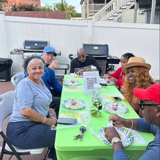 New Beginnings Reentry Services serves a communal meal.